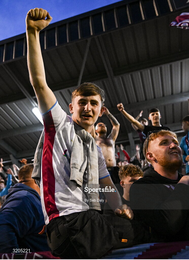 1 August 2025; Drogheda United supporters celebrate after their side's victory in the SSE Airtricity Men's Premier Division match between Bohemians and Drogheda United at Dalymount Park in Dublin. Photo by Seb Daly/Sportsfile