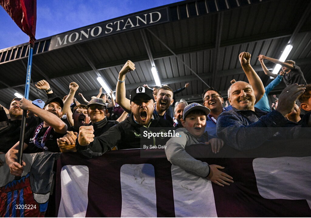 1 August 2025; Drogheda United supporters celebrate after their side's victory in the SSE Airtricity Men's Premier Division match between Bohemians and Drogheda United at Dalymount Park in Dublin. Photo by Seb Daly/Sportsfile