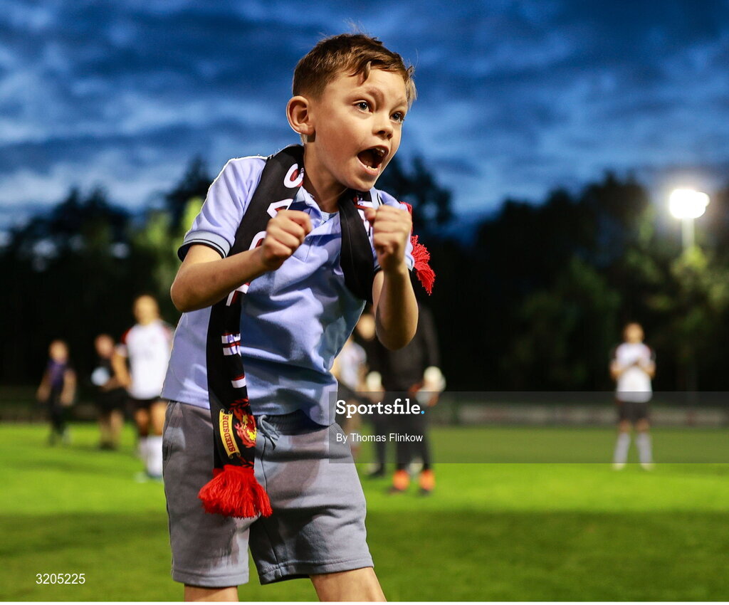1 August 2025; Young Dundalk supporter Charlie O'Hegan celebrates after the SSE Airtricity Men's First Division match between UCD and Dundalk at UCD Bowl in Belfield, Dublin. Photo by Thomas Flinkow/Sportsfile