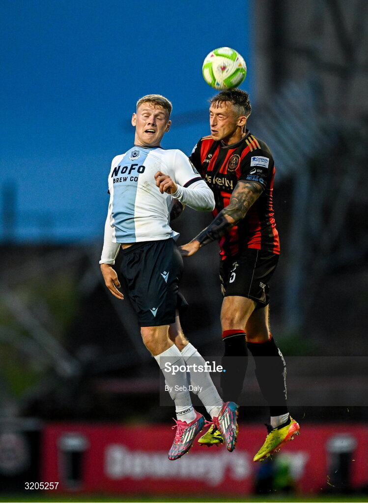 1 August 2025; Josh Thomas of Drogheda United in action against Rob Cornwall of Bohemians during the SSE Airtricity Men's Premier Division match between Bohemians and Drogheda United at Dalymount Park in Dublin. Photo by Seb Daly/Sportsfile