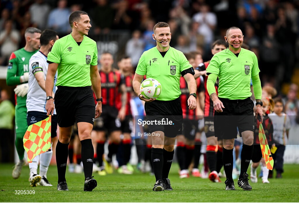 1 August 2025; Referee Paul Norton, centre, with assistants Fintan Butler, left, and Brian Fenlon before the SSE Airtricity Men's Premier Division match between Bohemians and Drogheda United at Dalymount Park in Dublin. Photo by Seb Daly/Sportsfile