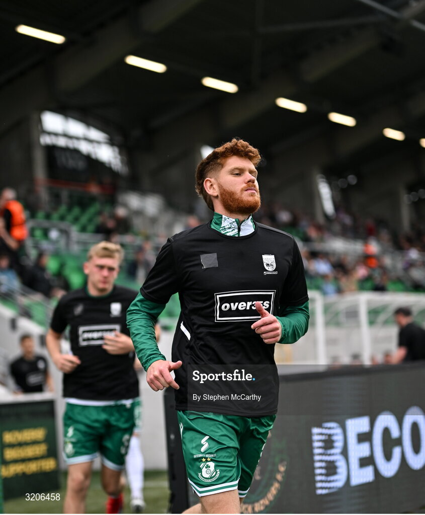 3 August 2025; Connor Malley of Shamrock Rovers runs out to warms up wearing the jersey of Templeogue United’s over 35’s in support of the O’Neill family before the SSE Airtricity Men's Premier Division match between Shamrock Rovers and Derry City at Tallaght Stadium in Dublin.  Photo by Stephen McCarthy/Sportsfile