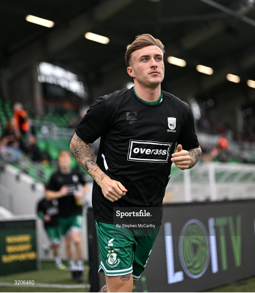 3 August 2025; Danny Grant of Shamrock Rovers runs out to warms up wearing the jersey of Templeogue United’s over 35’s in support of the O’Neill family before the SSE Airtricity Men's Premier Division match between Shamrock Rovers and Derry City at Tallaght Stadium in Dublin.  Photo by Stephen McCarthy/Sportsfile