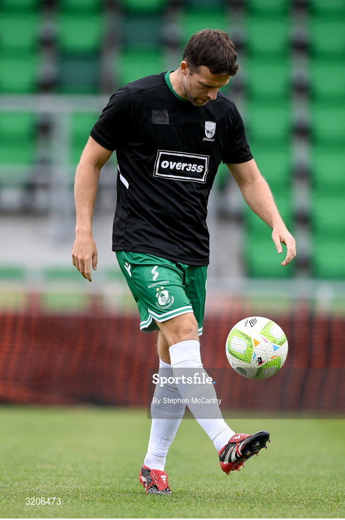 3 August 2025; Adam Matthews of Shamrock Rovers warms up wearing the jersey of Templeogue United’s over 35’s in support of the O’Neill family before the SSE Airtricity Men's Premier Division match between Shamrock Rovers and Derry City at Tallaght Stadium in Dublin.  Photo by Stephen McCarthy/Sportsfile