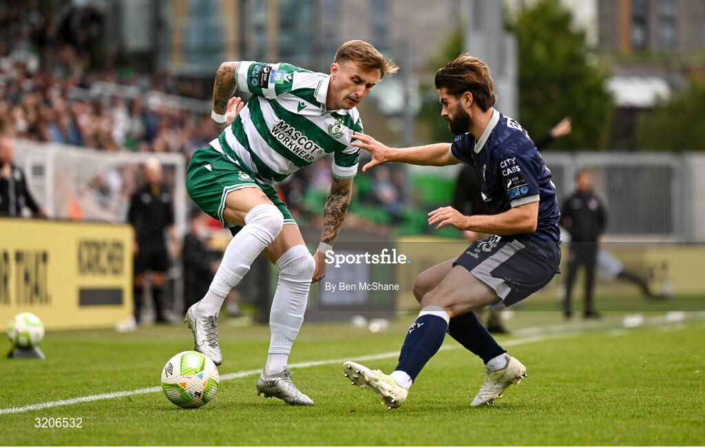 3 August 2025; Danny Grant of Shamrock Rovers in action against Brandon Fleming of Derry City during the SSE Airtricity Men's Premier Division match between Shamrock Rovers and Derry City at Tallaght Stadium in Dublin.  Photo by Ben McShane/Sportsfile