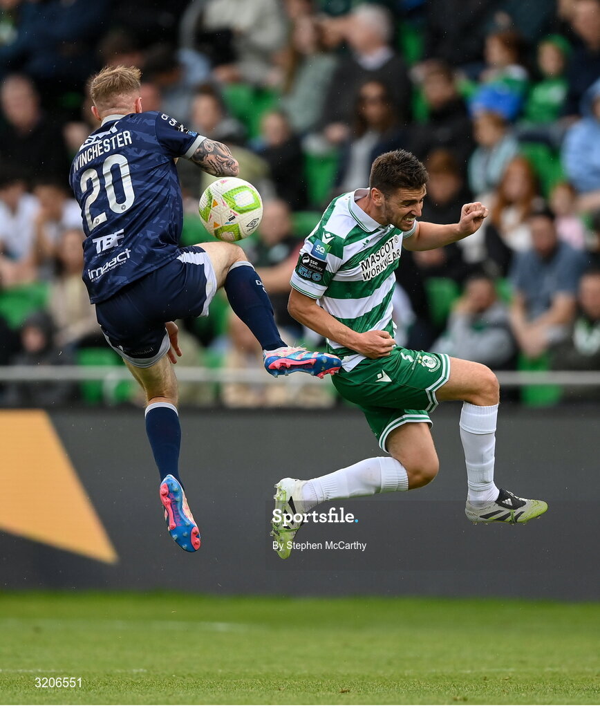 3 August 2025; Dylan Watts of Shamrock Rovers in action against Carl Winchester of Derry City during the SSE Airtricity Men's Premier Division match between Shamrock Rovers and Derry City at Tallaght Stadium in Dublin.  Photo by Stephen McCarthy/Sportsfile