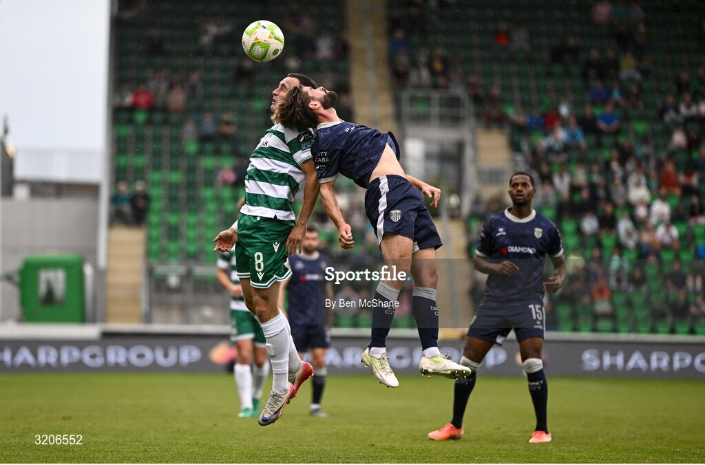 3 August 2025; Aaron McEneff of Shamrock Rovers in action against Brandon Fleming of Derry City during the SSE Airtricity Men's Premier Division match between Shamrock Rovers and Derry City at Tallaght Stadium in Dublin.  Photo by Ben McShane/Sportsfile