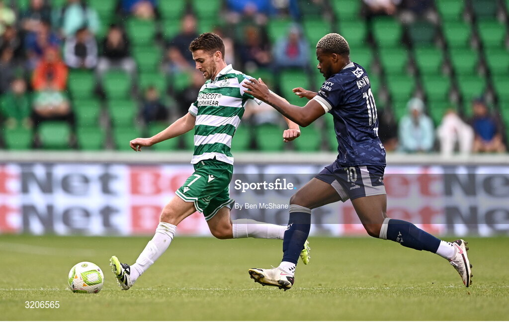 3 August 2025; Dylan Watts of Shamrock Rovers in action against Dipo Akinyemi of Derry City during the SSE Airtricity Men's Premier Division match between Shamrock Rovers and Derry City at Tallaght Stadium in Dublin.  Photo by Ben McShane/Sportsfile