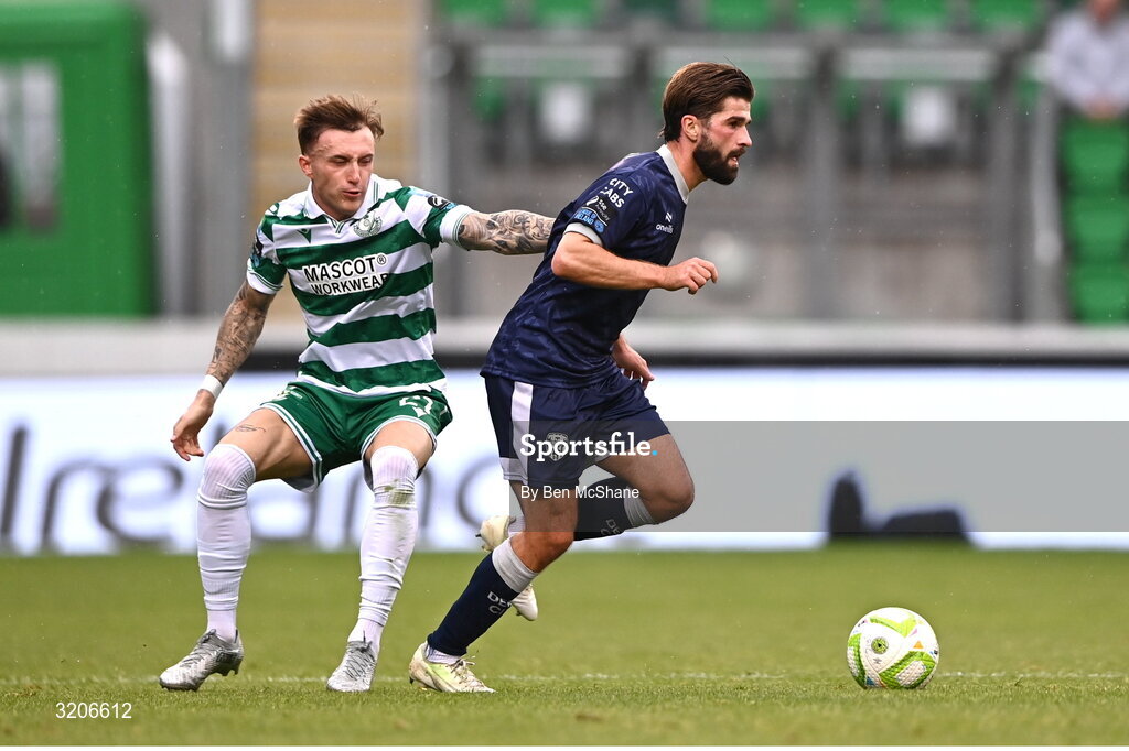 3 August 2025; Brandon Fleming of Derry City in action against Danny Grant of Shamrock Rovers during the SSE Airtricity Men's Premier Division match between Shamrock Rovers and Derry City at Tallaght Stadium in Dublin.  Photo by Ben McShane/Sportsfile