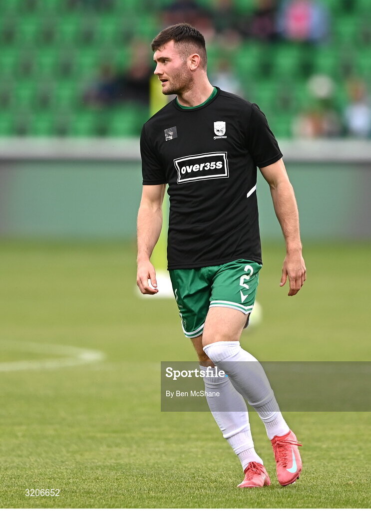 3 August 2025; Josh Honohan of Shamrock Rovers warms up wearing the jersey of Templeogue United Over 35s in support of the O'Neill Family before the SSE Airtricity Men's Premier Division match between Shamrock Rovers and Derry City at Tallaght Stadium in Dublin.  Photo by Ben McShane/Sportsfile