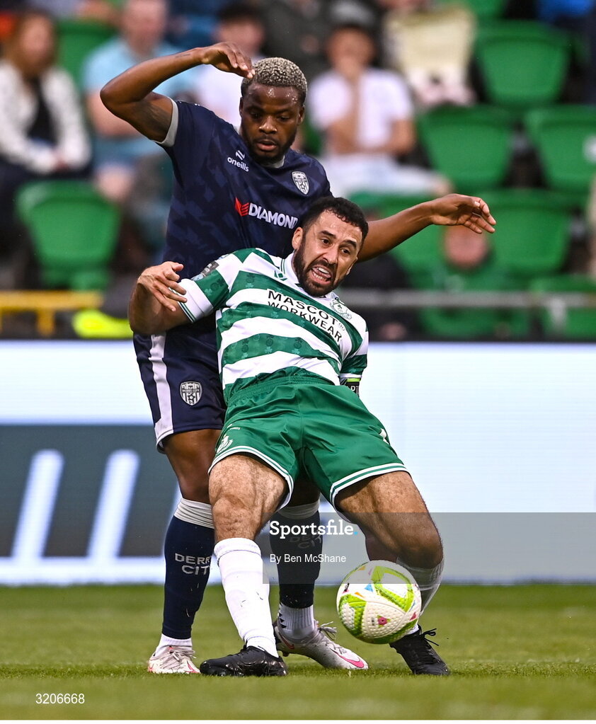 3 August 2025; Roberto Lopes of Shamrock Rovers in action against Dipo Akinyemi of Derry City during the SSE Airtricity Men's Premier Division match between Shamrock Rovers and Derry City at Tallaght Stadium in Dublin.  Photo by Ben McShane/Sportsfile