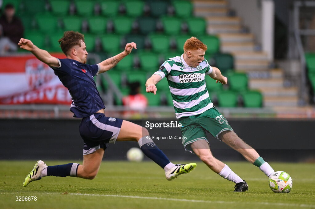3 August 2025; Rory Gaffney of Shamrock Rovers shoots to score his side's second goal despite the attention of Alex Bannon of Derry City during the SSE Airtricity Men's Premier Division match between Shamrock Rovers and Derry City at Tallaght Stadium in Dublin.  Photo by Stephen McCarthy/Sportsfile