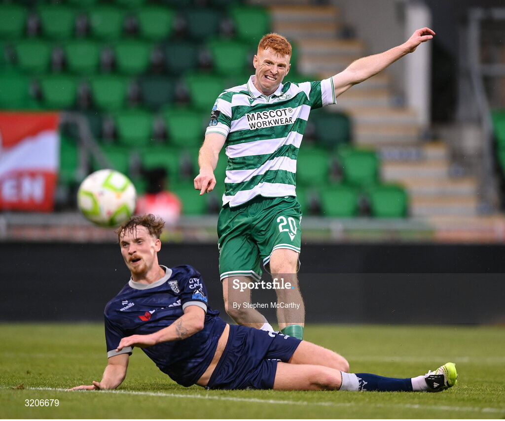 3 August 2025; Rory Gaffney of Shamrock Rovers shoots to score his side's second goal despite the attention of Alex Bannon of Derry City during the SSE Airtricity Men's Premier Division match between Shamrock Rovers and Derry City at Tallaght Stadium in Dublin.  Photo by Stephen McCarthy/Sportsfile