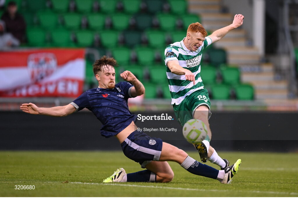 3 August 2025; Rory Gaffney of Shamrock Rovers shoots to score his side's second goal despite the attention of Alex Bannon of Derry City during the SSE Airtricity Men's Premier Division match between Shamrock Rovers and Derry City at Tallaght Stadium in Dublin.  Photo by Stephen McCarthy/Sportsfile