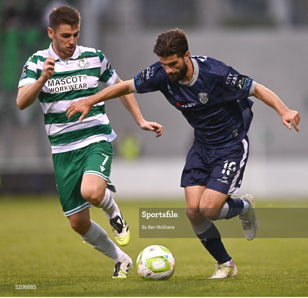 3 August 2025; Brandon Fleming of Derry City in action against Dylan Watts of Shamrock Rovers during the SSE Airtricity Men's Premier Division match between Shamrock Rovers and Derry City at Tallaght Stadium in Dublin.  Photo by Ben McShane/Sportsfile