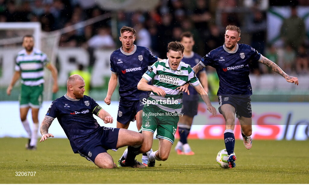 3 August 2025; Matt Healy of Shamrock Rovers is tackled by Mark Connolly of Derry City during the SSE Airtricity Men's Premier Division match between Shamrock Rovers and Derry City at Tallaght Stadium in Dublin.  Photo by Stephen McCarthy/Sportsfile