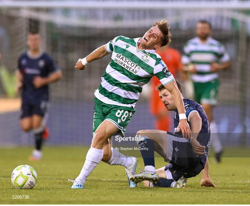 3 August 2025; John McGovern of Shamrock Rovers in action against Ben Doherty of Derry City during the SSE Airtricity Men's Premier Division match between Shamrock Rovers and Derry City at Tallaght Stadium in Dublin.  Photo by Stephen McCarthy/Sportsfile
