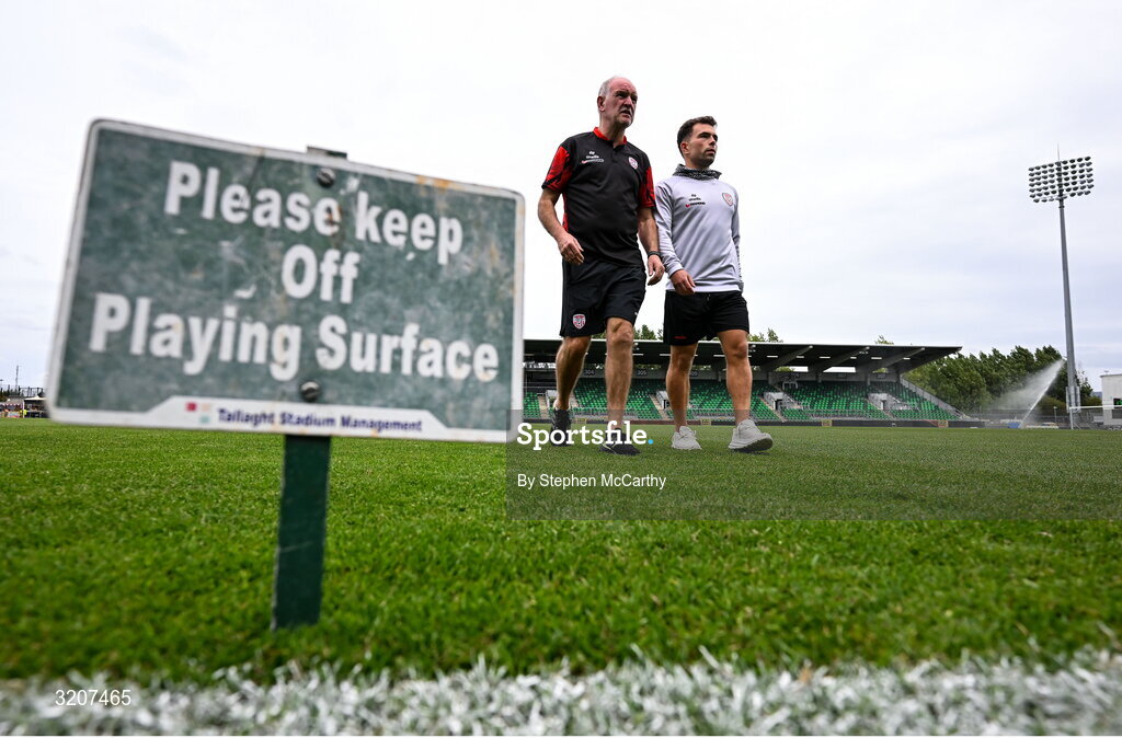 3 August 2025; Derry City kitman George Harkin and Adam Frizzell, right, before the SSE Airtricity Men's Premier Division match between Shamrock Rovers and Derry City at Tallaght Stadium in Dublin.  Photo by Stephen McCarthy/Sportsfile
