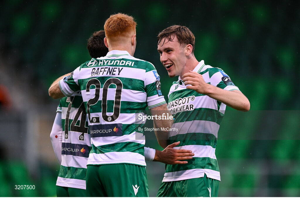 3 August 2025; Rory Gaffney, 20, is congratulated by his Shamrock Rovers team-mates Danny Mandroiu, left, and Matt Healy, right, after scoring their side's second goal during the SSE Airtricity Men's Premier Division match between Shamrock Rovers and Derry City at Tallaght Stadium in Dublin.  Photo by Stephen McCarthy/Sportsfile