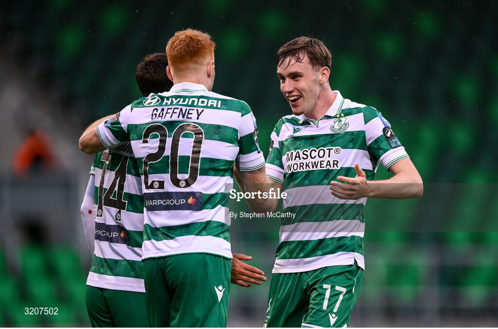 3 August 2025; Rory Gaffney, 20, is congratulated by his Shamrock Rovers team-mates Danny Mandroiu, left, and Matt Healy, right, after scoring their side's second goal during the SSE Airtricity Men's Premier Division match between Shamrock Rovers and Derry City at Tallaght Stadium in Dublin.  Photo by Stephen McCarthy/Sportsfile