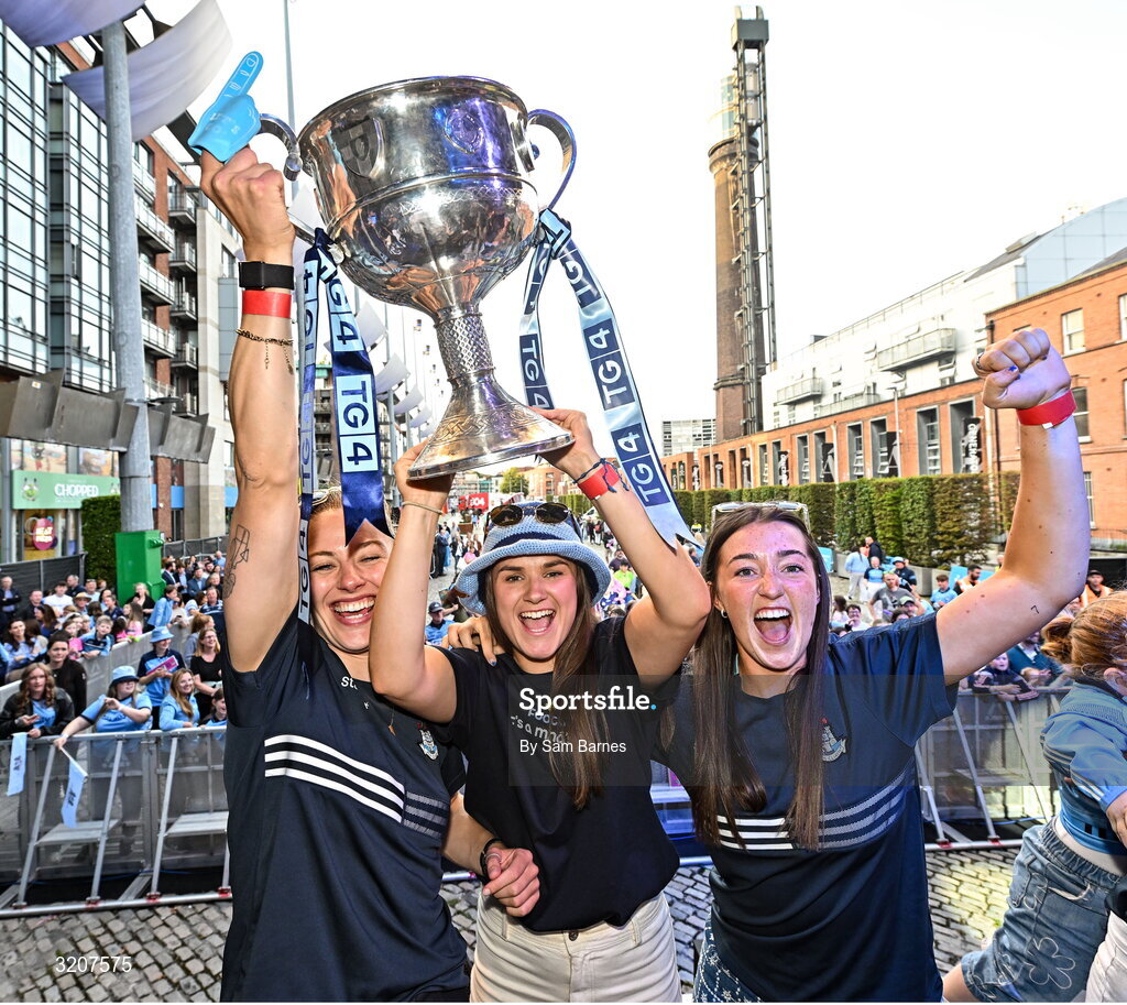 5 August 2025; Dublin players, from left, Nicole Owens, Kate Sullivan and Clodagh Fox with The Brendan Martin Cup during the homecoming of TG4 All-Ireland Ladies Senior Football Champions, Dublin, at Smithfield Square in Dublin. Photo by Sam Barnes/Sportsfile