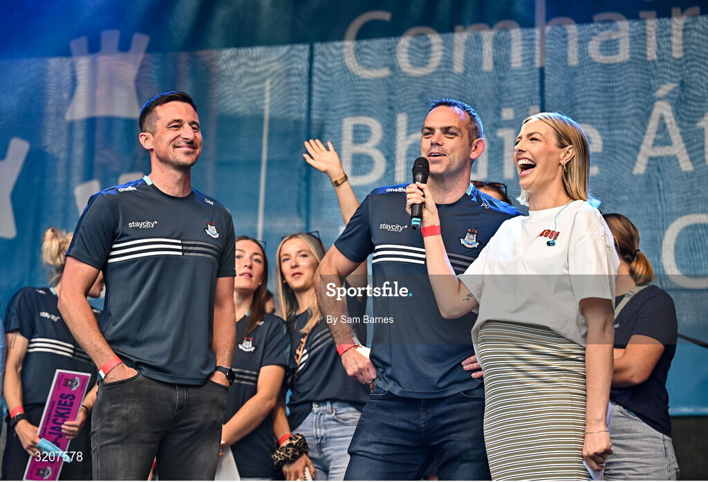 5 August 2025; Dublin joint manager Paul Casey, right, and Derek Murray are interviewed by MC Blathnaid Treacy during the homecoming of TG4 All-Ireland Ladies Senior Football Champions, Dublin, at Smithfield Square in Dublin. Photo by Sam Barnes/Sportsfile