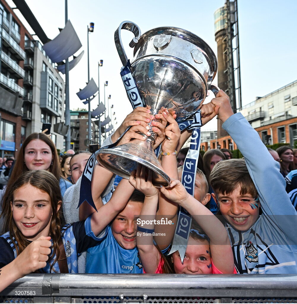 5 August 2025; Supporters with The Brendan Martin Cup during the homecoming of TG4 All-Ireland Ladies Senior Football Champions, Dublin, at Smithfield Square in Dublin. Photo by Sam Barnes/Sportsfile