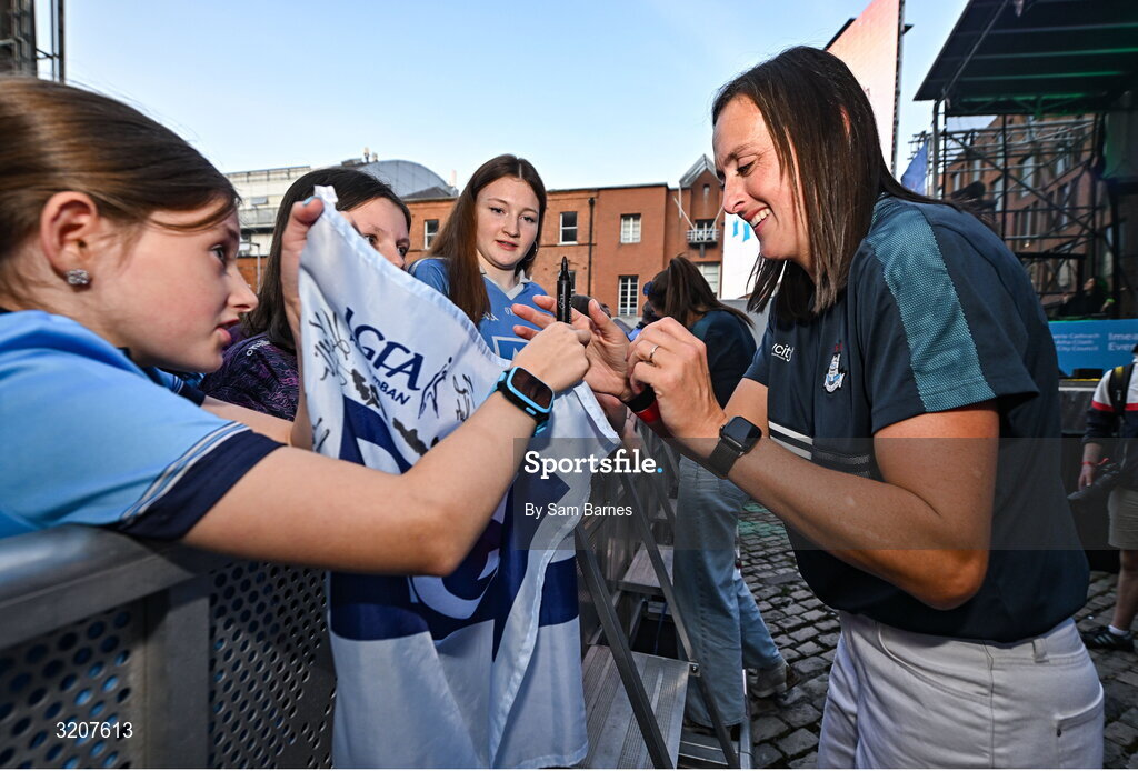 5 August 2025; Hannah Tyrrell signs autographs during the homecoming of TG4 All-Ireland Ladies Senior Football Champions, Dublin, at Smithfield Square in Dublin. Photo by Sam Barnes/Sportsfile