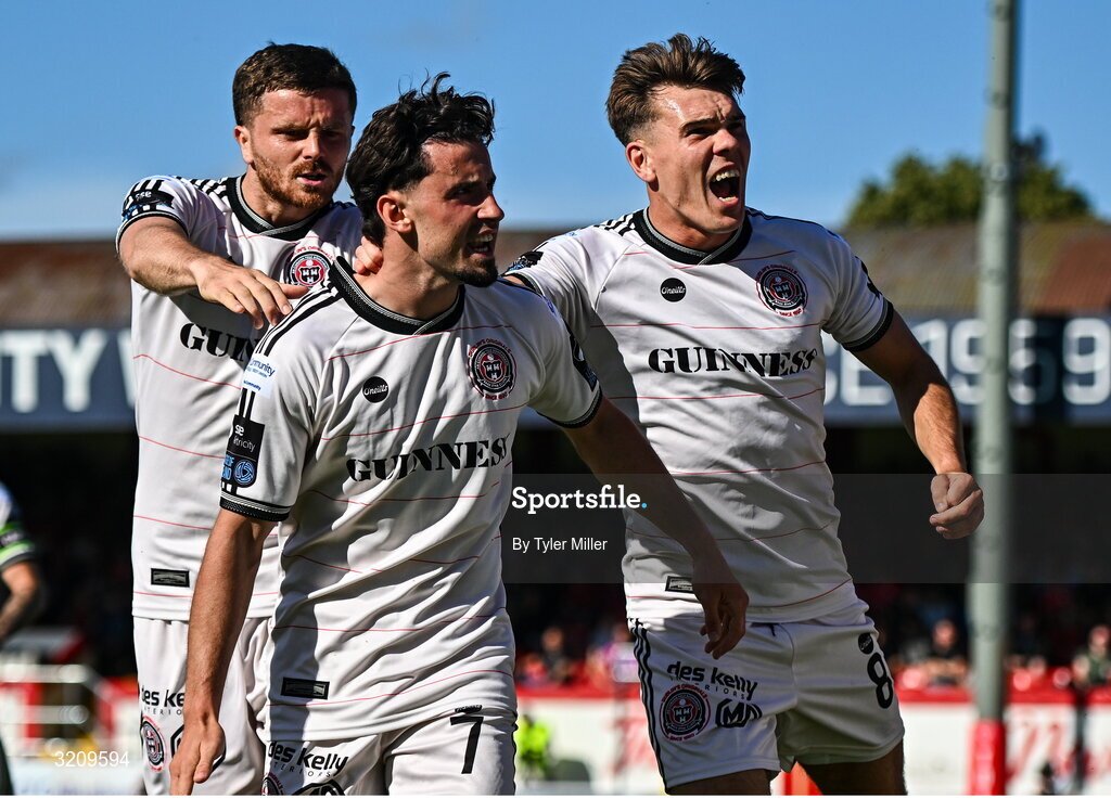 9 August 2025; Connor Parsons of Bohemians, centre, celebrates with team-mates Adam McDonnell, left, and Dayle Rooney after scoring their side's first goal during the SSE Airtricity Men's Premier Division match between Shelbourne and Bohemians at Tolka Park in Dublin. Photo by Tyler Miller/Sportsfile