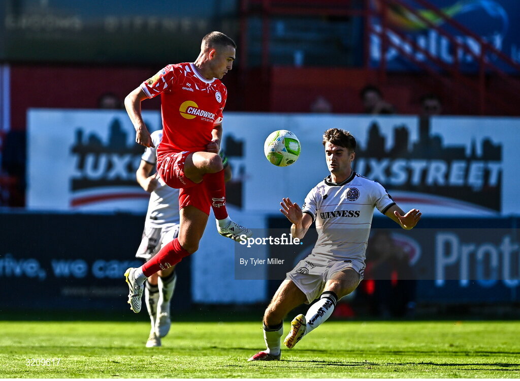9 August 2025; Evan Caffrey of Shelbourne in action against Niall Morahan of Bohemians during the SSE Airtricity Men's Premier Division match between Shelbourne and Bohemians at Tolka Park in Dublin. Photo by Tyler Miller/Sportsfile