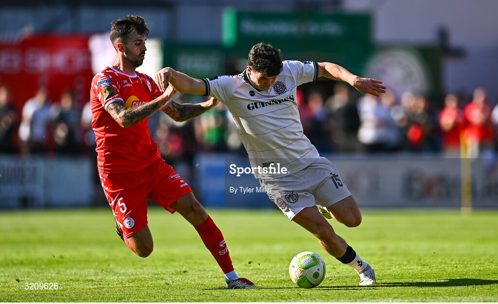 9 August 2025; James Clarke of Bohemians in action against Ellis Chapman of Shelbourne during the SSE Airtricity Men's Premier Division match between Shelbourne and Bohemians at Tolka Park in Dublin. Photo by Tyler Miller/Sportsfile