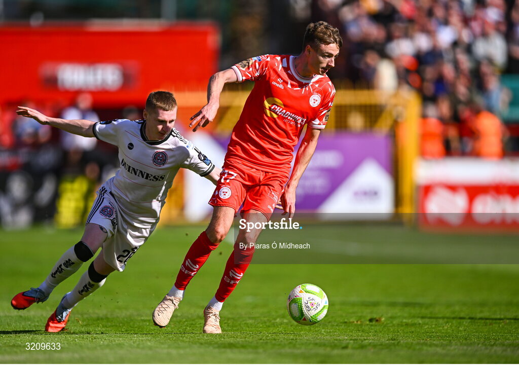 9 August 2025; Daniel Kelly of Shelbourne in action against Ross Tierney of Bohemians during the SSE Airtricity Men's Premier Division match between Shelbourne and Bohemians at Tolka Park in Dublin. Photo by Piaras Ó Mídheach/Sportsfile