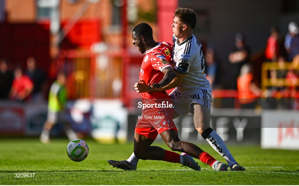 9 August 2025; Mipo Odubeko of Shelbourne in action against Leigh Kavanagh of Bohemians during the SSE Airtricity Men's Premier Division match between Shelbourne and Bohemians at Tolka Park in Dublin. Photo by Tyler Miller/Sportsfile