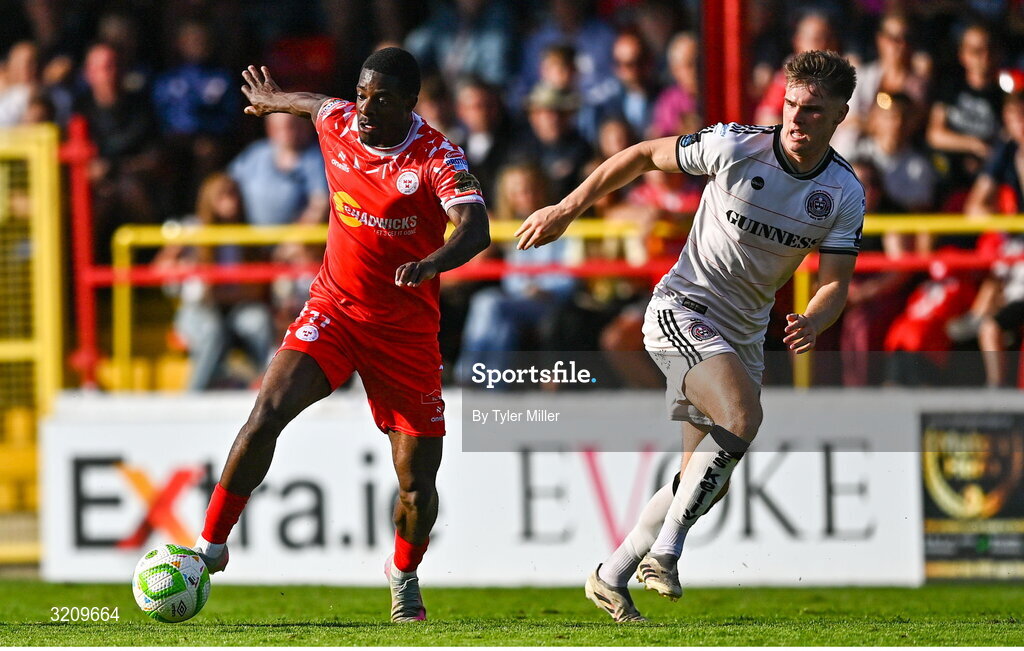 9 August 2025; Mipo Odubeko of Shelbourne in action against Leigh Kavanagh of Bohemians during the SSE Airtricity Men's Premier Division match between Shelbourne and Bohemians at Tolka Park in Dublin. Photo by Tyler Miller/Sportsfile