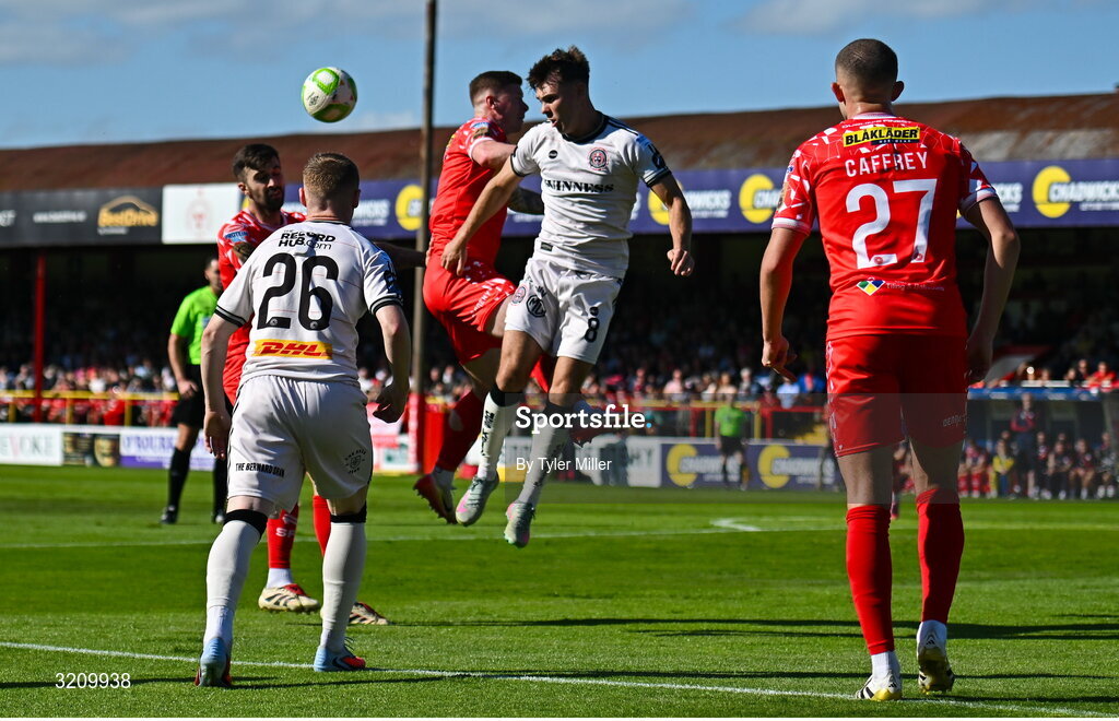 9 August 2025; Dayle Rooney of Bohemians in action against Kameron Ledwidge of Shelbourne during the SSE Airtricity Men's Premier Division match between Shelbourne and Bohemians at Tolka Park in Dublin. Photo by Tyler Miller/Sportsfile