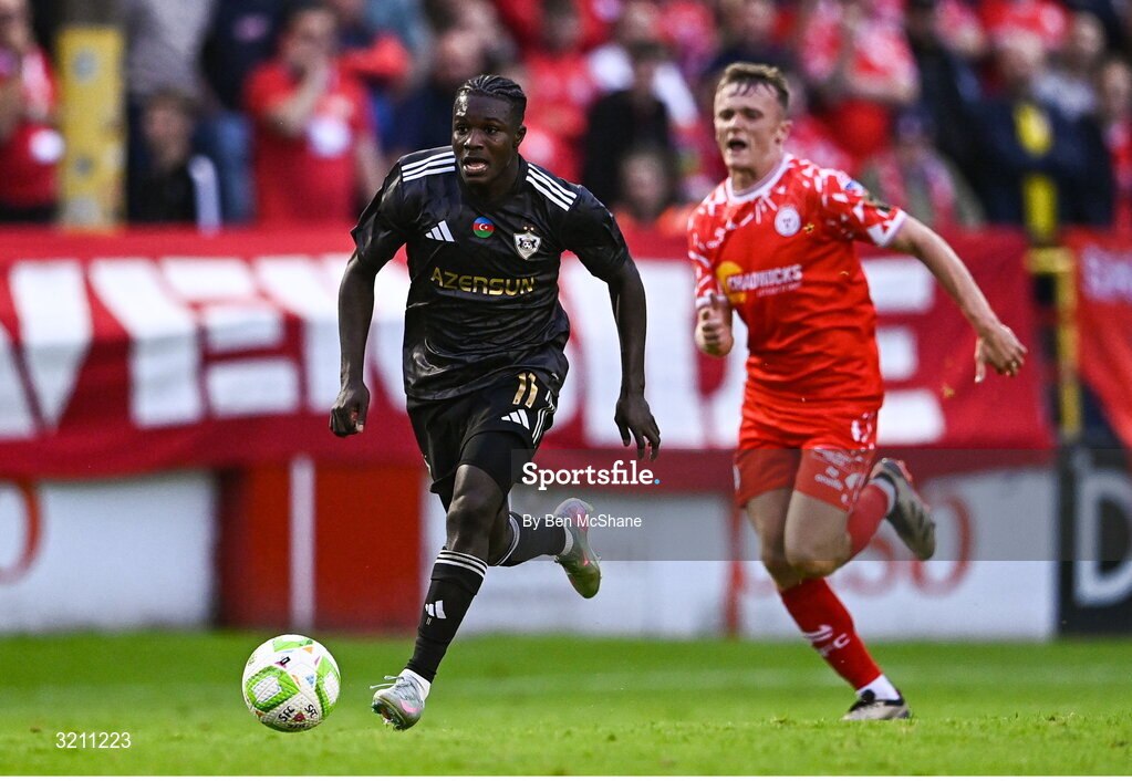23 July 2025; Emmanuel Addai of Qarabag and JJ Lunney of Shelbourne during the UEFA Champions League Second Qualifying Round first leg match between Shelbourne and Qarabag FK at Tolka Park in Dublin. Photo by Ben McShane/Sportsfile