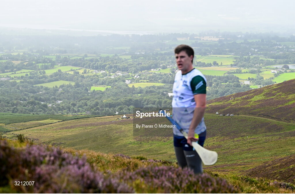4 August 2025; A general view of the mountain range as Cillian Kiely of Offaly looks on while competing in the Senior Hurling competition during the M. Donnelly GAA Poc Fada All-Ireland Finals at Annaverna Mountain in the Cooley Peninsula, Ravensdale, Louth. Photo by Piaras Ó Mídheach/Sportsfile
