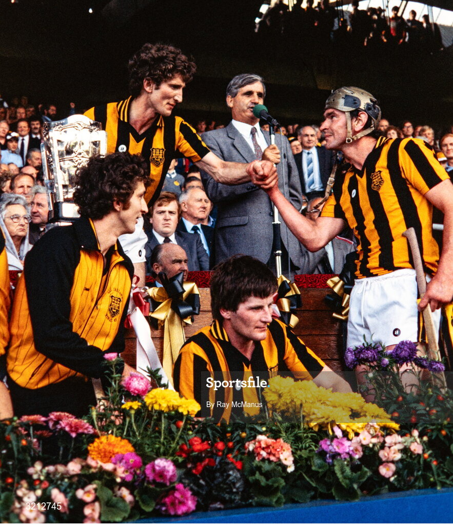 4 September 1983; Kilkenny captain Liam Fennelly celebrates with John Henderson, as GAA president Paddy Buggy makes his speech, after the All-Ireland Senior Hurling Championship Final match between Kilkenny and Cork at Croke Park in Dublin. Photo by Ray McManus/Sportsfile