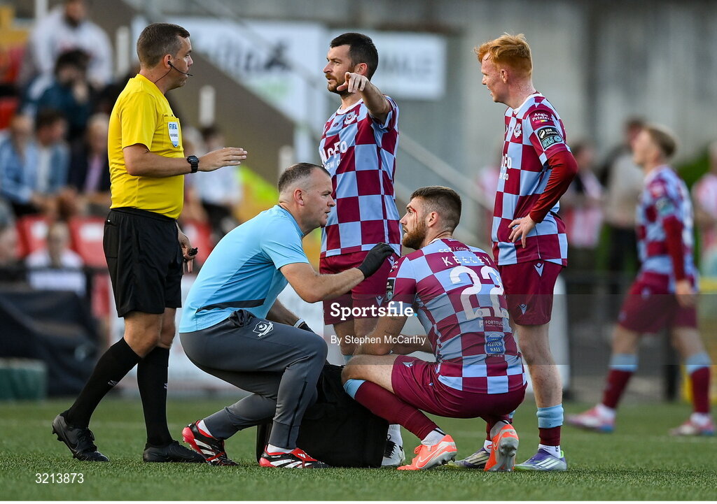 16 August 2025; Conor Keeley of Drogheda United receives medical attention from Drogheda United physiotherapist Keith Browne during the Sports Direct Men’s FAI Cup third round match between Derry City and Drogheda United at The Ryan McBride Brandywell Stadium in Derry. Photo by Stephen McCarthy/Sportsfile