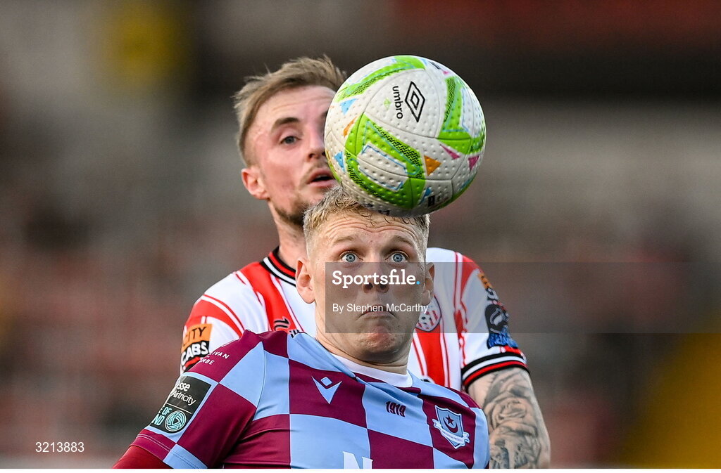 16 August 2025; Josh Thomas of Drogheda United in action against Carl Winchester of Derry City during the Sports Direct Men’s FAI Cup third round match between Derry City and Drogheda United at The Ryan McBride Brandywell Stadium in Derry. Photo by Stephen McCarthy/Sportsfile