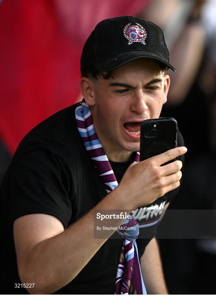 16 August 2025; A Drogheda United supporter celebrates his side's first goal during the Sports Direct Men’s FAI Cup third round match between Derry City and Drogheda United at The Ryan McBride Brandywell Stadium in Derry. Photo by Stephen McCarthy/Sportsfile