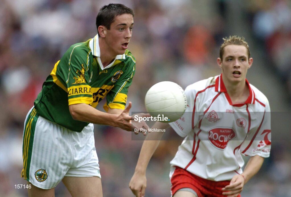26 September 2004; Anthony Maher, Kerry, in action against John Gilmore, Tyrone. All-Ireland Minor Football Championship Final, Kerry v Tyrone, Croke Park, Dublin. Picture credit; Ray McManus / SPORTSFILE *** Local Caption *** Any photograph taken by SPORTSFILE during, or in connection with, the 2004 All-Ireland Minor Football Final which displays GAA logos or contains an image or part of an image of any GAA intellectual property, or, which contains images of a GAA player/players in their playing uniforms, may only be used for editorial and non-advertising purposes.  Use of photographs for advertising, as posters or for purchase separately is strictly prohibited unless prior written approval has been obtained from the Gaelic Athletic Association.