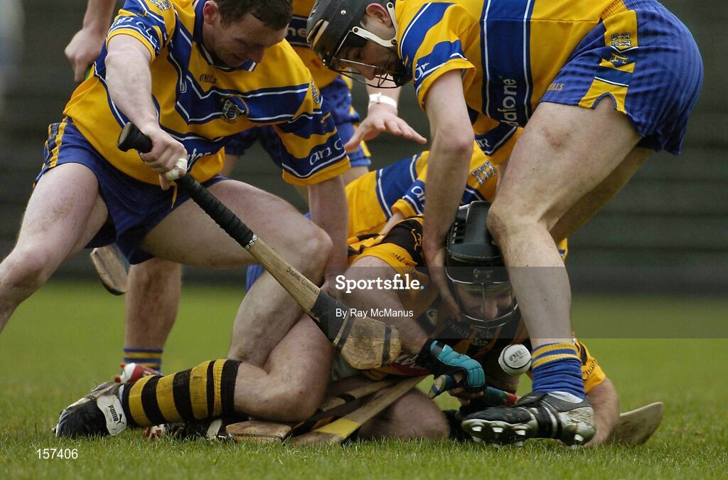 21 March 2004; DJ Carey, Kilkenny, is tackled by Clare defenders Brian Quinn and Sean McMahon. Allianz Hurling League 2004, Division 1A, Round 4, Clare v Kilkenny, Cusack Park, Ennis, Co. Clare. Picture credit; Ray McManus / SPORTSFILE