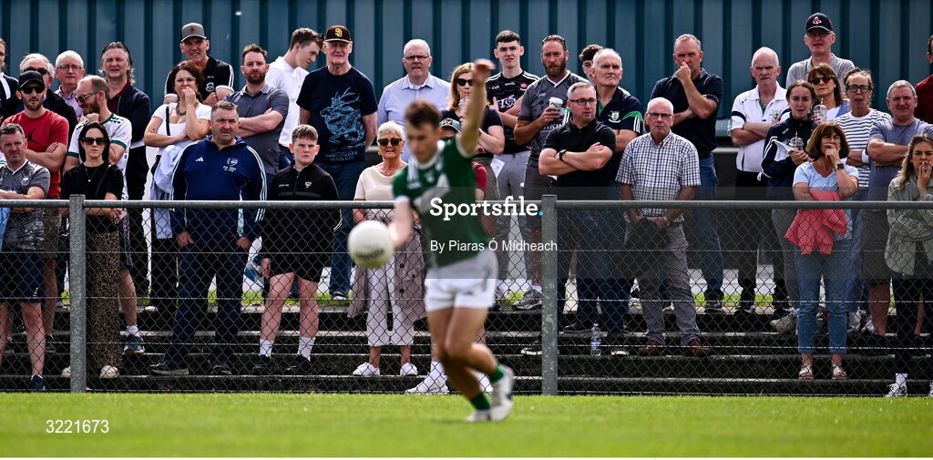 24 August 2025; Spectators watch as Paul Towey of Charlestown Sarsfields takes a free during the Mayo County Senior Club Football Championship Round 2 match between Charlestown Sarsfields and Ballaghaderreen at Fr O'Hara Park in Charlestown, Mayo. Photo by Piaras Ó Mídheach/Sportsfile