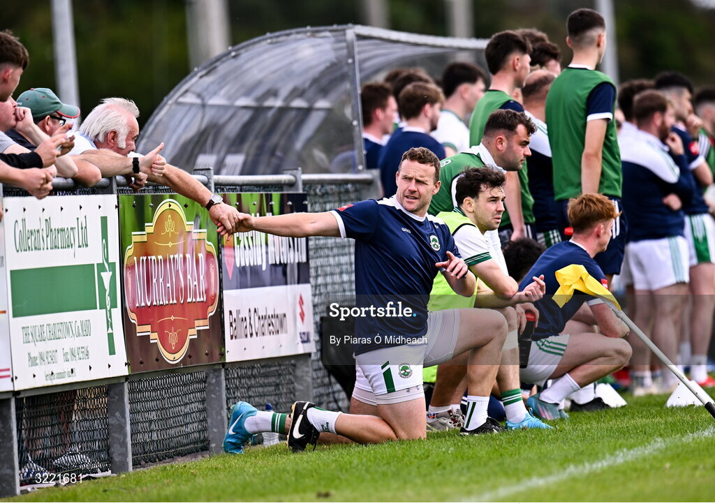 24 August 2025; Andy Moran of Ballaghaderreen shakes hands with a a supporter as he stretches on the sideline during the Mayo County Senior Club Football Championship Round 2 match between Charlestown Sarsfields and Ballaghaderreen at Fr O'Hara Park in Charlestown, Mayo. Photo by Piaras Ó Mídheach/Sportsfile