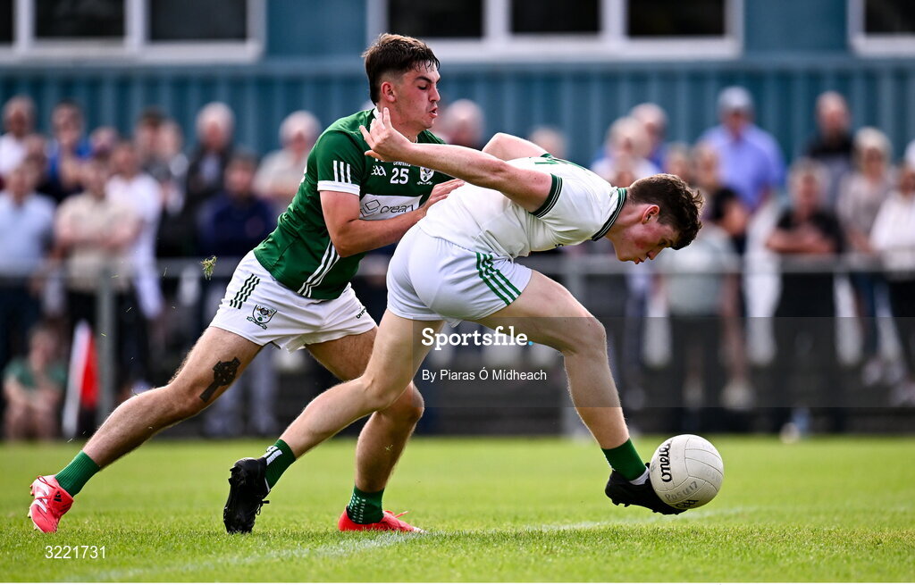 24 August 2025; Matthew Connor of Ballaghaderreen scores his side's third goal, under pressure from Tomas Goldrick of Charlestown Sarsfields, during the Mayo County Senior Club Football Championship Round 2 match between Charlestown Sarsfields and Ballaghaderreen at Fr O'Hara Park in Charlestown, Mayo. Photo by Piaras Ó Mídheach/Sportsfile