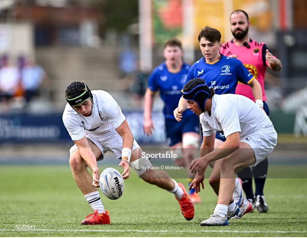 27 August 2025; James Reid of Ulster, left, during the PwC U-18 Boys Schools Interprovincial Series match between Leinster and Ulster at Energia Park in Dublin. Photo by Piaras Ó Mídheach/Sportsfile