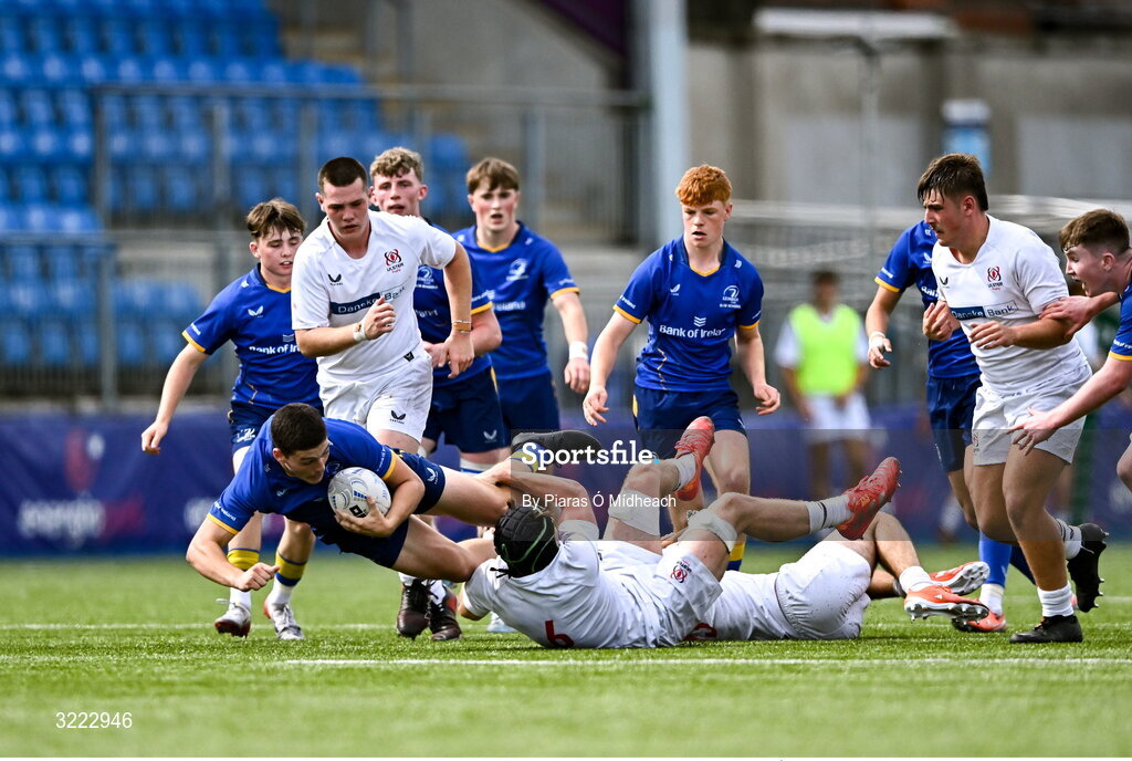 27 August 2025; Michael Smyth of Leinster is tackled by James Reid of Ulster during the PwC U-18 Boys Schools Interprovincial Series match between Leinster and Ulster at Energia Park in Dublin. Photo by Piaras Ó Mídheach/Sportsfile