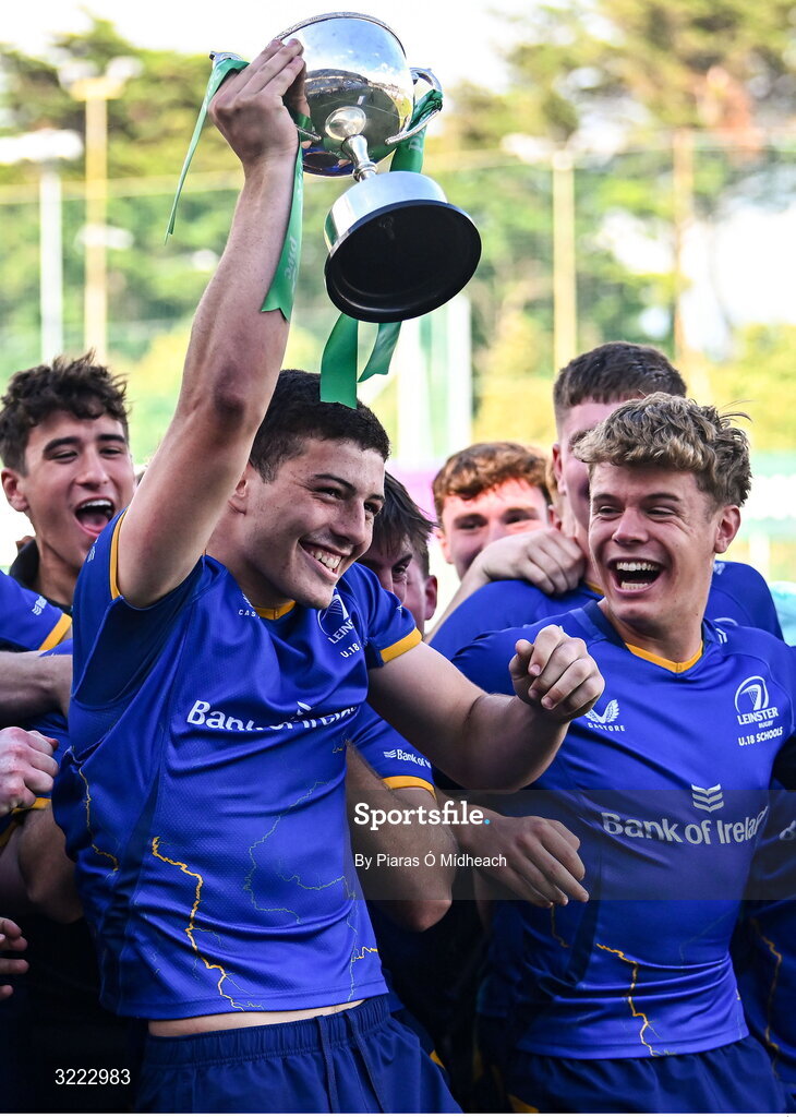 27 August 2025; Leinster captain Michael Smyth lifts the cup after his side's victory in the PwC U-18 Boys Schools Interprovincial Series match between Leinster and Ulster at Energia Park in Dublin. Photo by Piaras Ó Mídheach/Sportsfile
