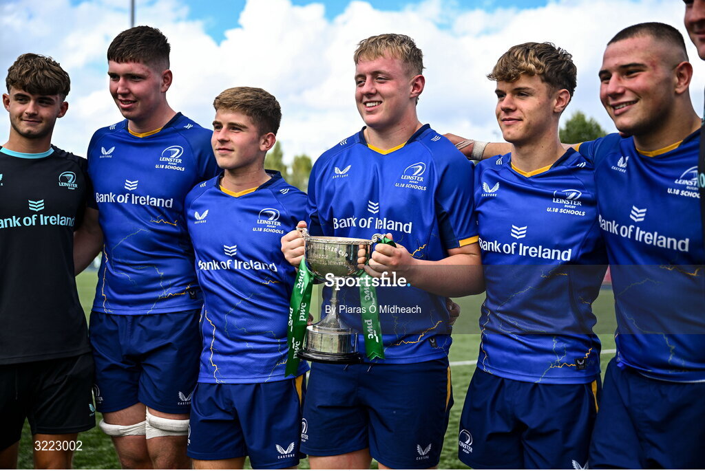 27 August 2025; Dan O’Donohoe of Leinster holds the cup as he celebrates with team-mates after the PwC U-18 Boys Schools Interprovincial Series match between Leinster and Ulster at Energia Park in Dublin. Photo by Piaras Ó Mídheach/Sportsfile